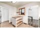 Kitchen island, stainless appliances, with access to living areas at 9832 High St, Thornton, CO 80229