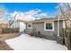 Exterior view of home with a fenced backyard and siding at 5761 W 71St Ave, Arvada, CO 80003