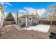 Charming fenced backyard featuring a patio, and ample space for outdoor activities at 5761 W 71St Ave, Arvada, CO 80003