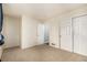 This room features neutral walls, carpet, and a closet at 5761 W 71St Ave, Arvada, CO 80003