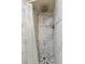 Updated bathroom with decorative tile shower and rain shower head at 5886 S Nepal Way, Centennial, CO 80015