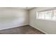 Bedroom features a neutral paint color, plush carpet and large window for natural light at 5886 S Nepal Way, Centennial, CO 80015