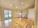 Bright and spacious living room with hardwood floors and large windows at 5886 S Nepal Way, Centennial, CO 80015