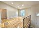 Open living area featuring hardwood floors and natural light from a window at 5886 S Nepal Way, Centennial, CO 80015