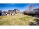 Expansive back yard with a patio set perfect for outdoor entertaining and relaxation at 2070 E 125Th Pl, Thornton, CO 80241