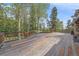 Expansive deck has room for outdoor living and dining at 80 Castlewood Ct, Evergreen, CO 80439