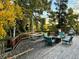 Enjoy outdoor living on this deck with seating area at 80 Castlewood Ct, Evergreen, CO 80439