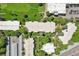 An aerial view of the community featuring walking paths, mature trees, and manicured grounds at 625 S Clinton St # 7A, Denver, CO 80247