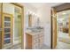 Well-lit bathroom featuring shower and attractive vessel sink vanity at 625 S Clinton St # 7A, Denver, CO 80247