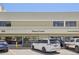 Exterior of the fitness center with ample parking and community response signage at 625 S Clinton St # 7A, Denver, CO 80247