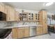 Bright kitchen with stainless steel appliances, granite countertops, and ample storage at 625 S Clinton St # 7A, Denver, CO 80247