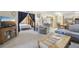 Cozy living room featuring comfortable seating, open to bedroom, and classic design at 625 S Clinton St # 7A, Denver, CO 80247