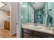 Well lit bathroom with vanity and paint at 4691 S Fraser Cir # A, Aurora, CO 80015