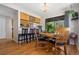 Charming dining room with hardwood floors and a view to the kitchen at 4691 S Fraser Cir # A, Aurora, CO 80015