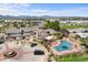Stunning aerial view showcasing the well-maintained property, pool, and mountain views at 4760 S Wadsworth Blvd # K205, Littleton, CO 80123