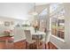 Bright dining area with large windows and stylish decor at 4760 S Wadsworth Blvd # K205, Littleton, CO 80123