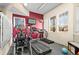 Well-equipped exercise room featuring a treadmill and elliptical machine at 4760 S Wadsworth Blvd # K205, Littleton, CO 80123