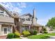 Attractive townhouse with well-maintained landscaping and brick accents at 4760 S Wadsworth Blvd # K205, Littleton, CO 80123