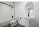 Modern bathroom featuring a bathtub and shower combination, along with a sleek vanity at 2361 Junegrass Ln, Louisville, CO 80027