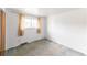 Bedroom showcasing a window with curtains at 2630 W Asbury Ave, Denver, CO 80219