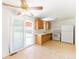 Spacious kitchen with sliding glass doors to the backyard, ideal for indoor-outdoor living at 2630 W Asbury Ave, Denver, CO 80219