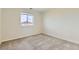 Comfortable bedroom with soft carpet and a window offering natural light at 17040 Galapago Ct, Broomfield, CO 80023