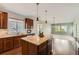 Well-equipped kitchen showcasing a center island, granite countertops, and stainless steel appliances at 17040 Galapago Ct, Broomfield, CO 80023