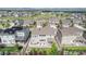 Aerial view of a residential neighborhood with mountain views, showcasing a well-maintained home and surroundings at 1195 Fox Hills Ct, Erie, CO 80516