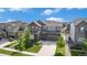 Attractive home showcasing stone accents and a two-car garage complemented by mature landscaping at 1195 Fox Hills Ct, Erie, CO 80516