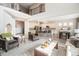 Open-concept living room provides a seamless transition to the kitchen and dining areas at 1195 Fox Hills Ct, Erie, CO 80516