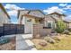 Eye-catching modern home with professional landscaping creating great curb appeal at 2339 W 66Th Ave, Denver, CO 80221