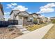Attractive modern home with neutral siding, concrete walkway, and curated landscaping enhancing the curb appeal at 2339 W 66Th Ave, Denver, CO 80221