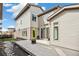 Contemporary home featuring modern architecture, sleek lines, and a inviting outdoor patio space at 2339 W 66Th Ave, Denver, CO 80221