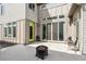 A comfortable patio with a fire pit is a wonderful outdoor space for this property at 2339 W 66Th Ave, Denver, CO 80221