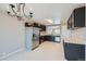 Functional kitchen featuring stainless steel appliances, ample cabinet space, and neutral-toned walls at 4296 Clover Ln, Brighton, CO 80601