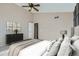 Bedroom with vaulted ceiling and carpeted floor at 4296 Clover Ln, Brighton, CO 80601