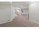 Open basement featuring carpeted flooring, stairs, and neutral paint at 12695 Wolff St, Broomfield, CO 80020