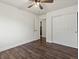 Clean bedroom with hardwood floors, ceiling fan and closet at 12695 Wolff St, Broomfield, CO 80020