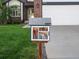 Close up of the little library in front of the home with a variety of books at 12695 Wolff St, Broomfield, CO 80020