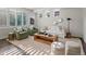 Cozy living room with stylish furniture, neutral colors, and ample natural light at 12695 Wolff St, Broomfield, CO 80020