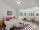 Spacious main bedroom with high ceilings, plantation shutters and sitting area at 12695 Wolff St, Broomfield, CO 80020