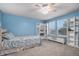 Inviting bedroom with built-in bookcases and a window seat for relaxing at 15562 E 109Th Ave, Commerce City, CO 80022