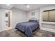 Finished basement bedroom with a unique window nook and an ensuite bath at 15562 E 109Th Ave, Commerce City, CO 80022