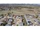 Scenic aerial shot of a residential area close to grassland, displaying the community's serene setting at 7019 S Garrison St, Littleton, CO 80128