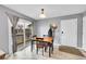Cozy dining area with sliding doors leading to a private balcony overlooking yard at 2281 Coronado Pkwy # D, Denver, CO 80229