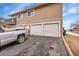 Private two-car garage plus exterior parking along side of the property at 2281 Coronado Pkwy # D, Denver, CO 80229