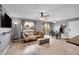 Inviting living room featuring hardwood floors and ample natural light at 2281 Coronado Pkwy # D, Denver, CO 80229