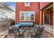 Backyard patio with outdoor seating, ideal for relaxing or gatherings at 2853 Yosemite St, Denver, CO 80238