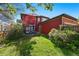 Lush backyard offering a private outdoor retreat with space for recreation at 2853 Yosemite St, Denver, CO 80238