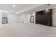 Spacious basement featuring neutral carpet and built in closet at 2853 Yosemite St, Denver, CO 80238